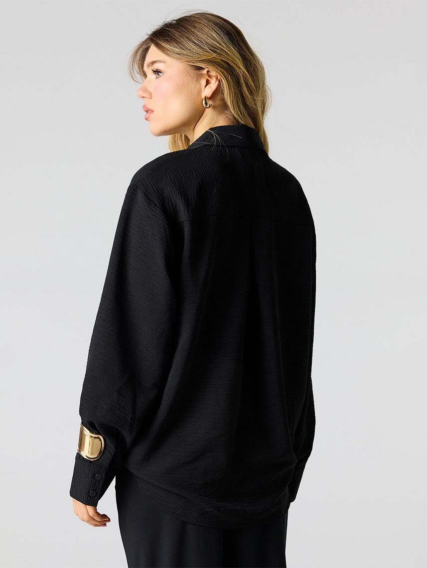 חולצת אוברסייז מכופתרת