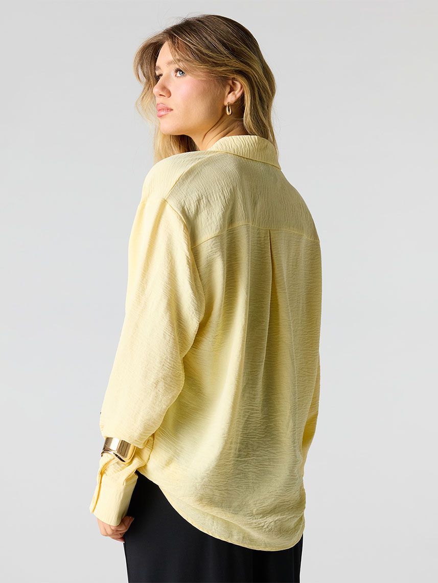 חולצת אוברסייז מכופתרת