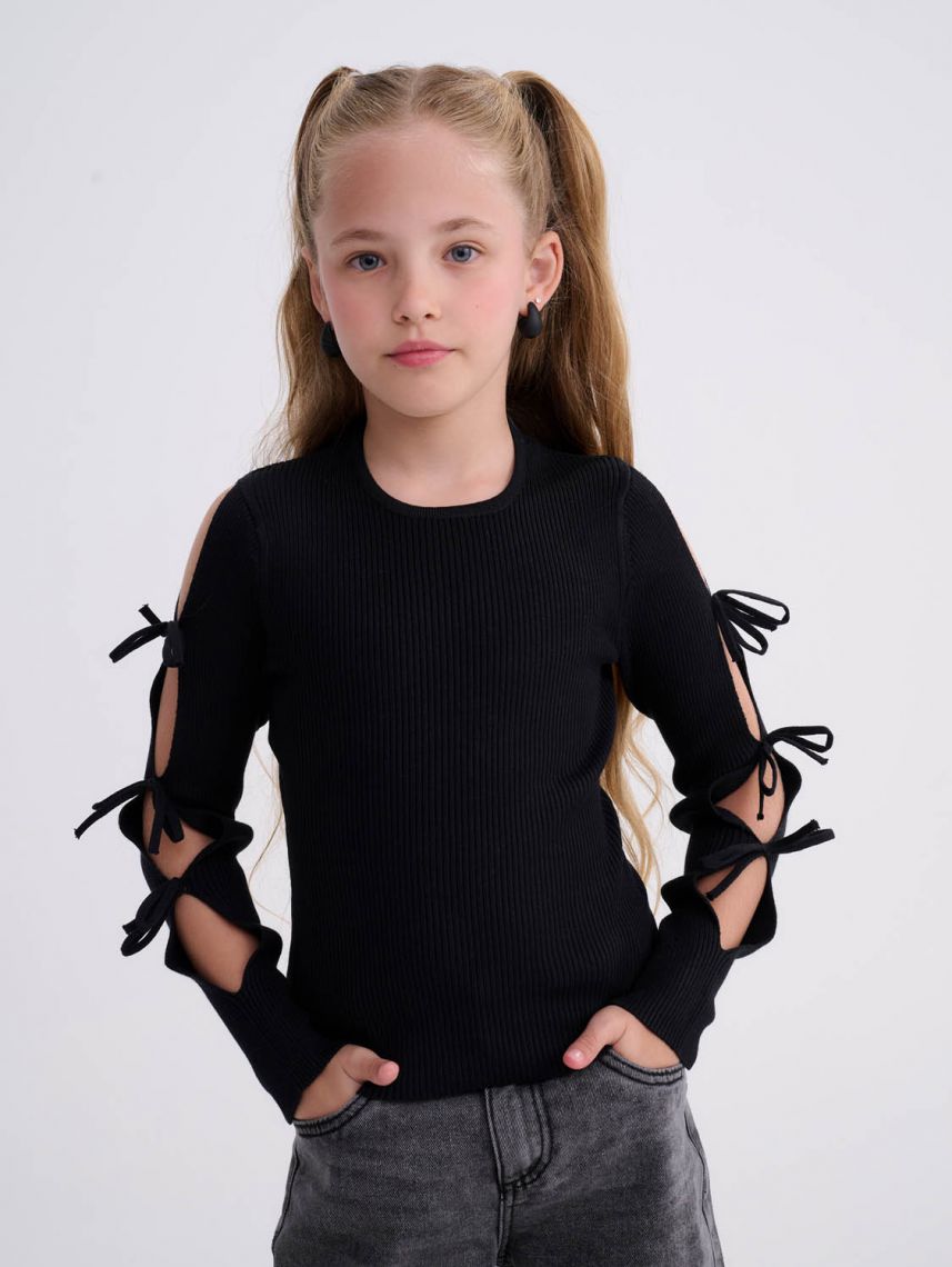 סריג עם פפיונים בשרוולים