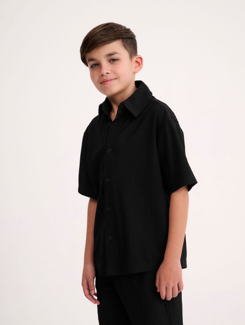 חולצה מכופתרת קצרה