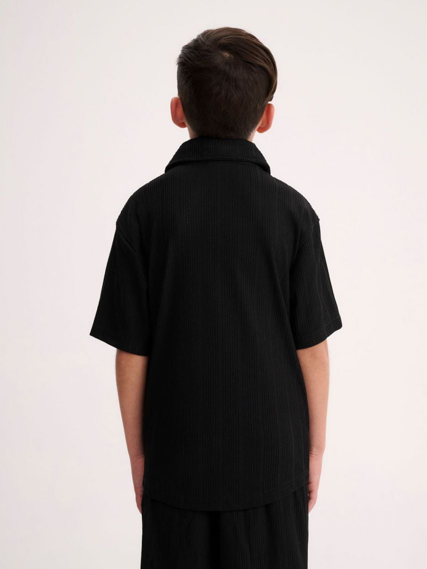 חולצה מכופתרת קצרה