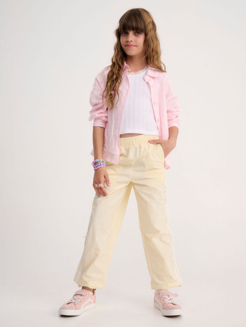 מכנסיים מעוטרים פפיונים