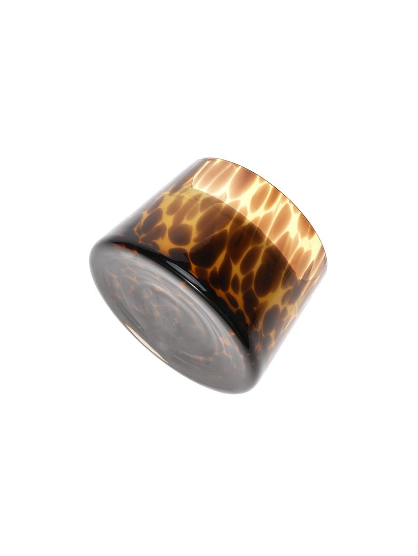 נר במעמד זכוכית מנומר