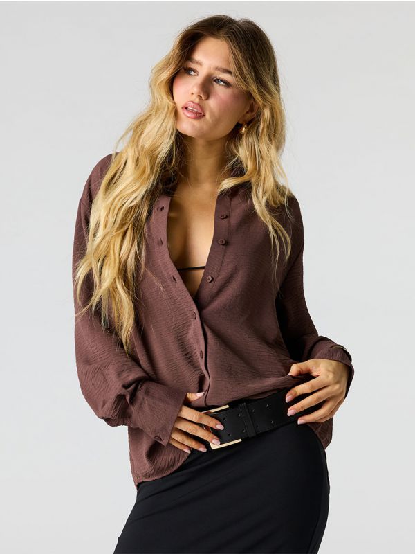 חולצת אוברסייז מכופתרת