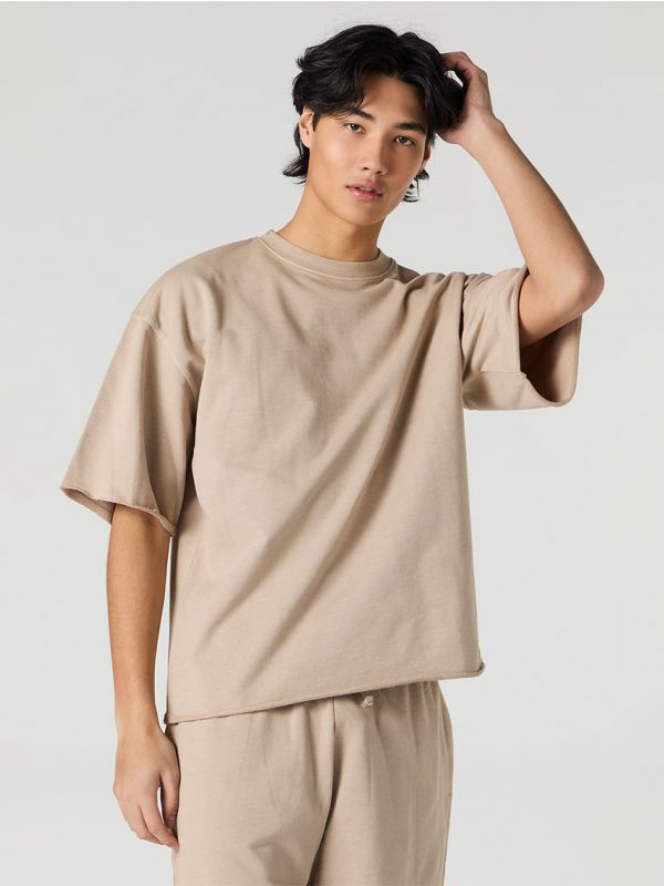 טי-שירט בוקסי שטופה