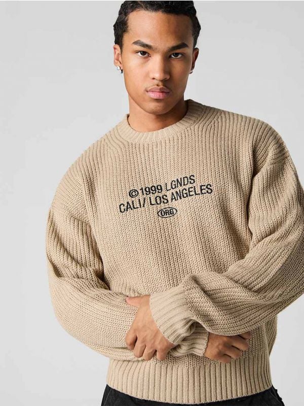 סוודר עם רקמה LA