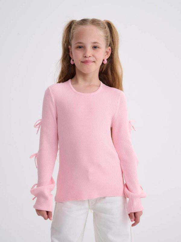 סריג עם פפיונים בשרוולים