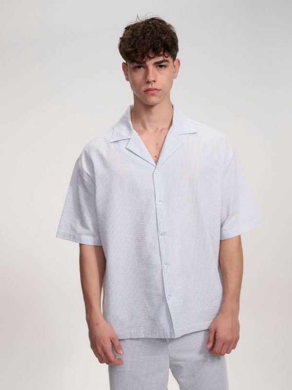 חולצת פסים מכופתרת