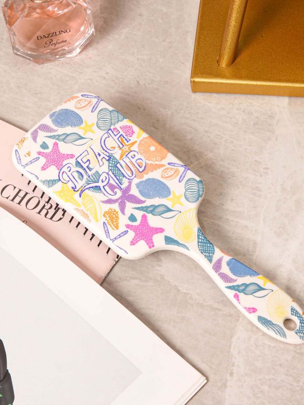 מברשת שיער טרייסי