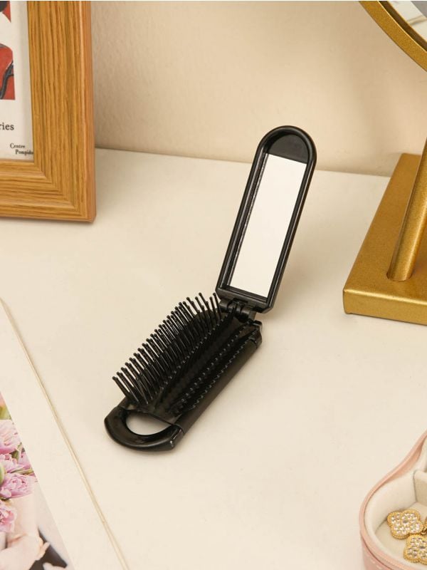 מברשת מראה מתקפלת