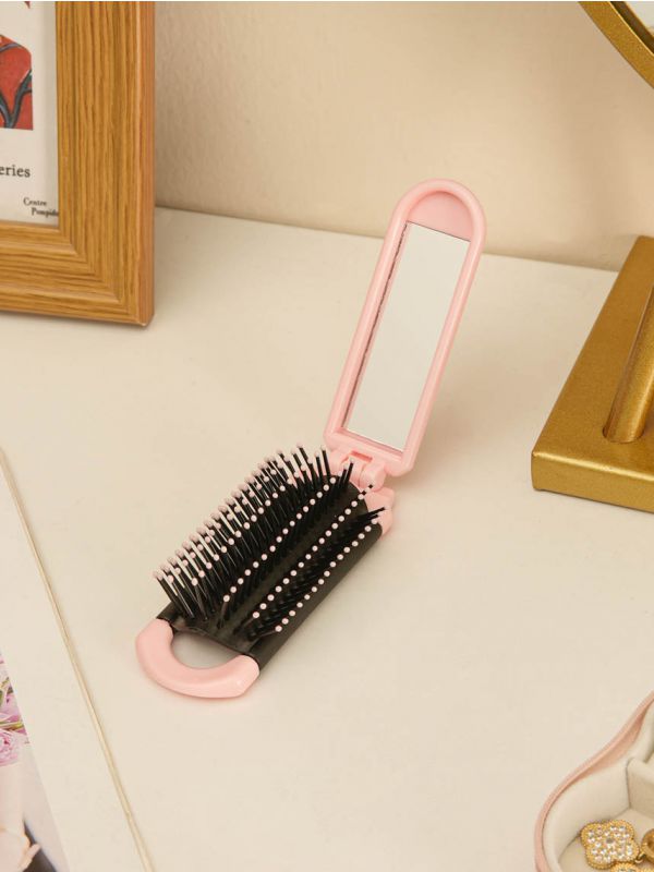 מברשת מראה מתקפלת