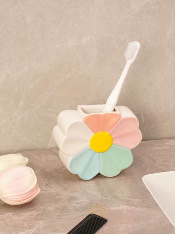 כוס פרח למברשות שיניים